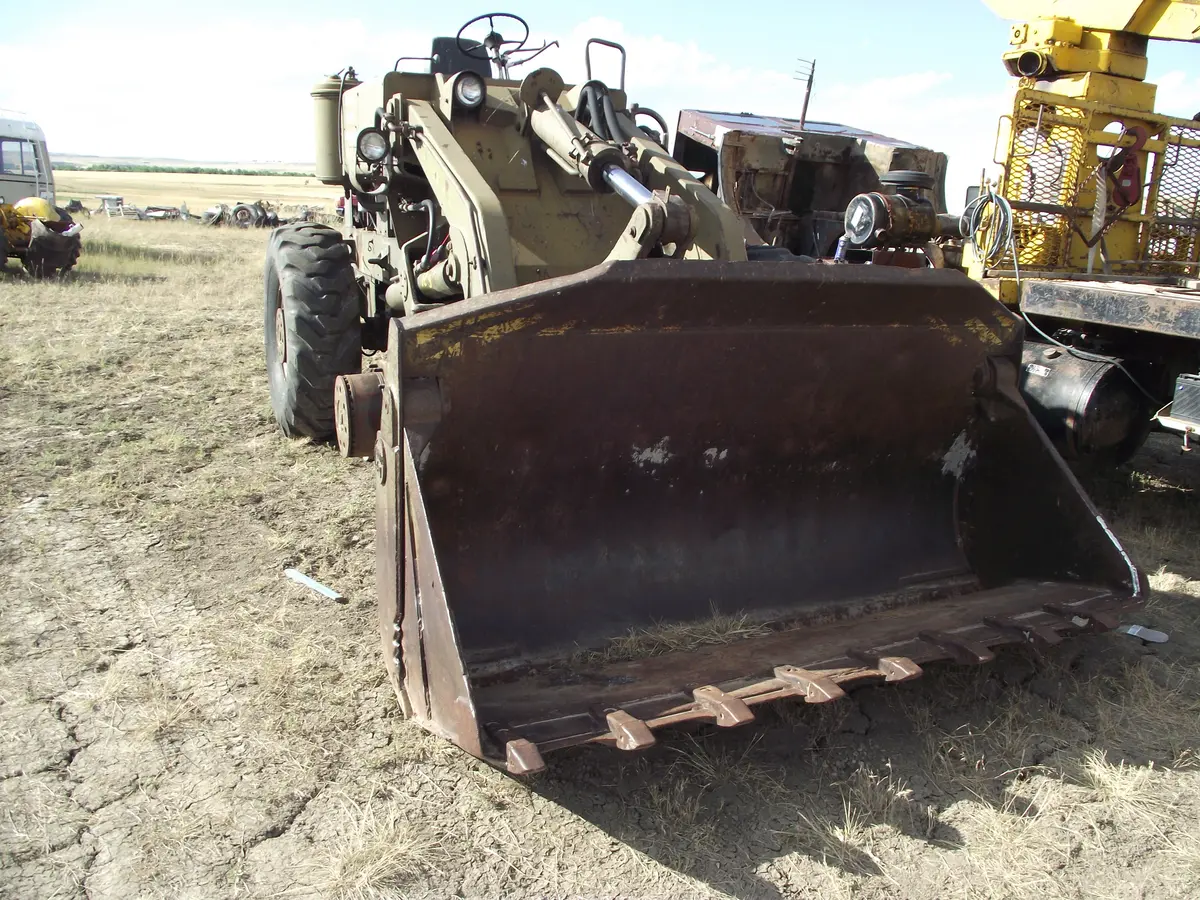 Either Loader  And  Weldco Full  Log Grapple 1