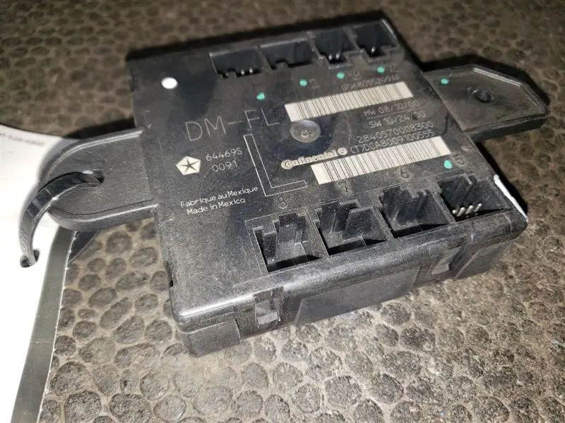 2011 Dodge Ram 1500 Driver Front Door Module. Part Number 68055299Af 1