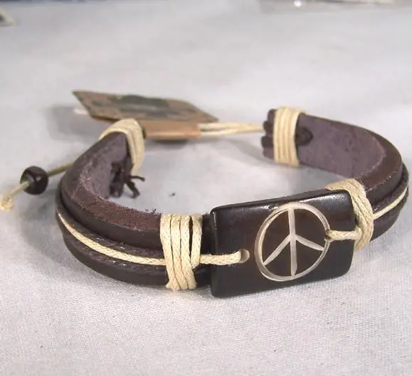 Carved Bone Leather Peace Sign Bracelet 1
