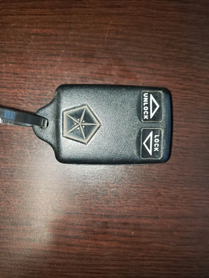 1997 Ram Two Button Remote Lock Key Fob. Part Number 56007049 1