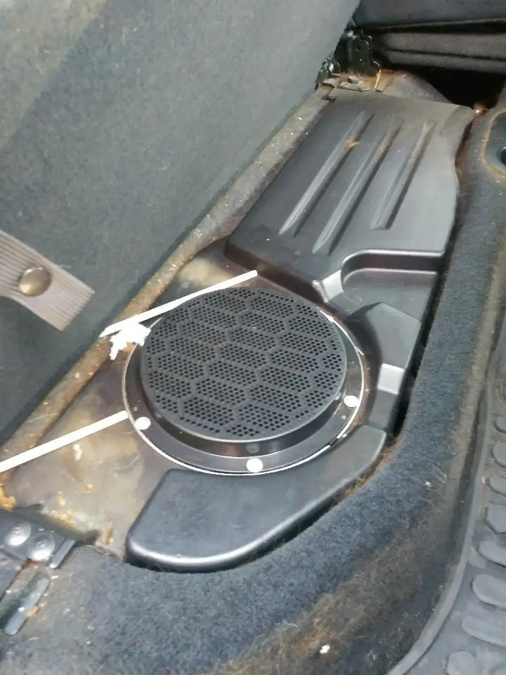 2017 Ram (2009-2026) Rear Under Seat Mounted Subwoofer. Part Number 5064369Ab 1
